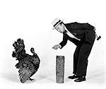 1930s - 1940s MAN CHARACTER WITH HATCHET TRYING TO CATCH A THANKSGIVING TURKEY