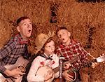 1950s - 1960s TWO BROTHERS AND A SISTER PLAYING INSTRUMENTS GUITARS AND BANJO SINGING COUNTRY MUSIC