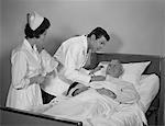 1960s DOCTOR AND NURSE CHECKING ON ELDERLY MALE PATIENT IN HOSPITAL BED