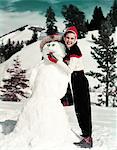 1940s - 1950s SMILING WOMAN HOLDING CIGAR IN SNOWMAN'S MOUTH