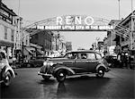 1930s NIGHT OF ARCH OVER MAIN STREET RENO NEVADA NEON SIGN THE BIGGEST LITTLE CITY IN THE WORLD