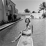 1930s WOMAN ON POOL DIVING BOARD PALM TREE