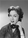 1950s - 1960s HAPPY SMILING WOMAN HAVING TELEPHONE CONVERSATION
