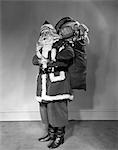 1940s SANTA CLAUS CARRYING BAG FULL OF TOYS ON HIS BACK