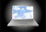 Laptop with clouds on screen