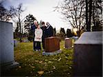 Family Grieving in Cemetery