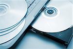 Close up image of computer and cd and dvd