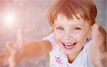 Portrait of a happy liitle girl close-up