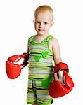 little boy in red boxing gloves on white background