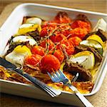 venison skewers with grilled tomatoes and potatoes