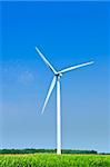 Green alternative clean power wind turbine in field