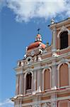 Fragment of Catholic Church in baroque style with great number architectural details and embellishments. Vilnius,  Lithuania.