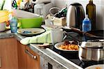 Pile of dirty dishes in the kitchen - Compulsive Hoarding Syndrom