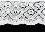 White lace with pattern in the manner of flower on black background