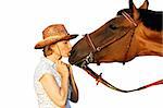 Woman in hat kissing a brown horse. Original image also in my portfolio.