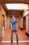 Portrait of a student posing in a corridor