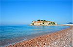 Beautiful rocky beach near Sveti Stefan island in Montenegro