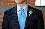 Image of a Blue Pinstriped Suit with Tie and Boutonniere