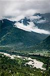 valley with river between high mountains in clouds, North India,  Himalayan