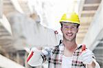 handsome hard worker people portrait at concstuction site