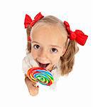 Little girl with large lollipop candy - top view, isolated