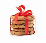 stack of christmas chocolate cookies tied red ribbon isolated on white background