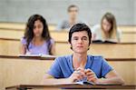 Focused students during a lecture in an amphitheater