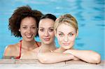 Three Female Friends In Swimming Pool