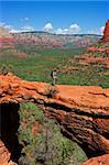 Man hiking at Devils Bridge in Sedona Arizona