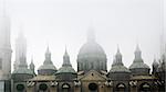 Detail of the domes of ancient architecture with fog