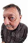 Photo of a man in his sixties using a fisheye lens to exaggerate his features.