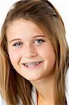 Portrait Of Smiling Teenage Girl With Braces