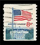 UNITED STATES - CIRCA 1950: mail stamp printed the USA featuring the White House government building and national flag, circa 1950