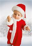 Small baby in suit Santa Claus on new year's background