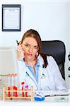 Medical doctor woman tired of her work at office