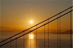 Golden Sunrise over Golden Gate Bridge and Oakland Bay Bridge