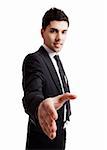 Young businessman giving handshake up isolated over a white background