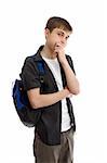 A male teenage student wearing casual clothes and carrying a backpack, is thinking, analysing or making a decision.  White background.