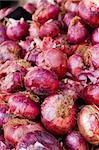 Close-up of a pile of fresh red onions