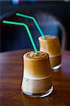 Close-up of two glasses of refreshing ice coffee