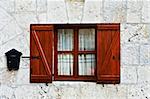 Decorated Closed Window and Postbox in Spanish Town