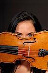 beautiful woman playing the violin