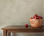 Fresh apples on wooden table