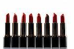 different red lipstick isolated on white background
