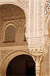 Detail of arabic carvings of Nasrid Palaces in the Alhambra of Granada in Andalusia, Spain