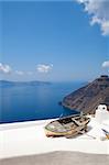 Old rowing boat on a rooftop in Thira, Santorini, Greece