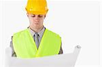 Builder looking at a plan against a white background