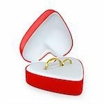 Pair of wedding rings in a heart shaped box isolated on white background