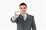 Businessman showing his businesscard against a white background