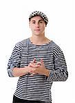 Handsome well-wishing young man portrait in stylish striped dress and cap